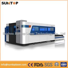 China 2000W Fiber Laser Cutting machine with exchanger working table , laser protection cabinet supplier
